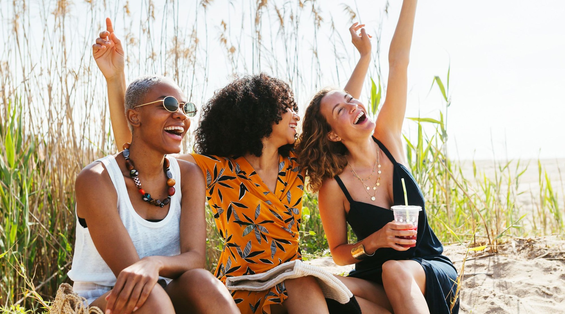three women laughing